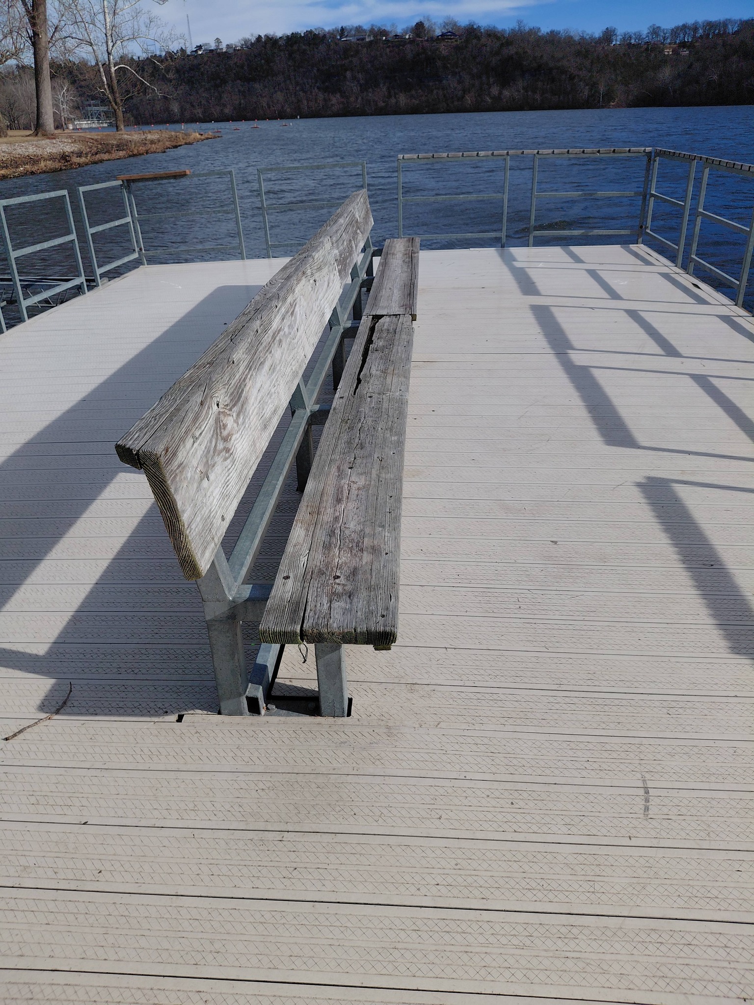 Bench on a dock overlooking the lake